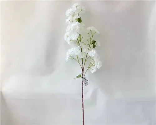 Como as flores de seda de flores de cerejeira replicam a delicada textura de pétalas de sakura reais?